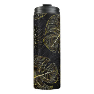 Golden monstera leaves, romantic seamless floral. thermal tumbler