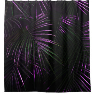 Golden painted date palm leaf closeup on dark blac