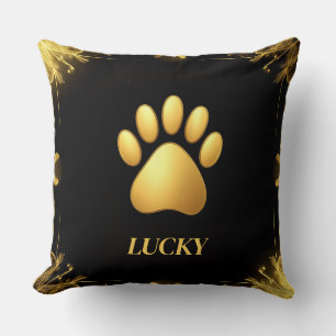 Golden Paw Print Against Black Background Throw Pillow