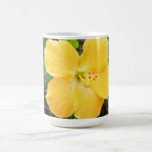 "Golden Radiance: Yellow Hibiscus Flower on a Tree Coffee Mug