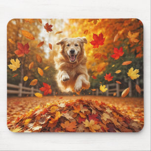 Golden Retriever Jumping In Autumn Leaf Pile Mouse Pad
