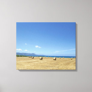 Golden Rolls of Hay and Deep Blue Sea Design  Canvas Print