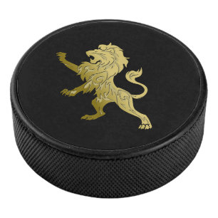 Golden Royal Lion on Black Hockey Puck