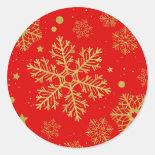 Golden snowflakes on red classic round sticker