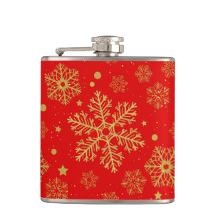 Golden snowflakes on red hip flask