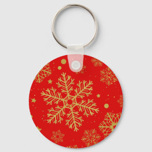 Golden snowflakes on red keychain