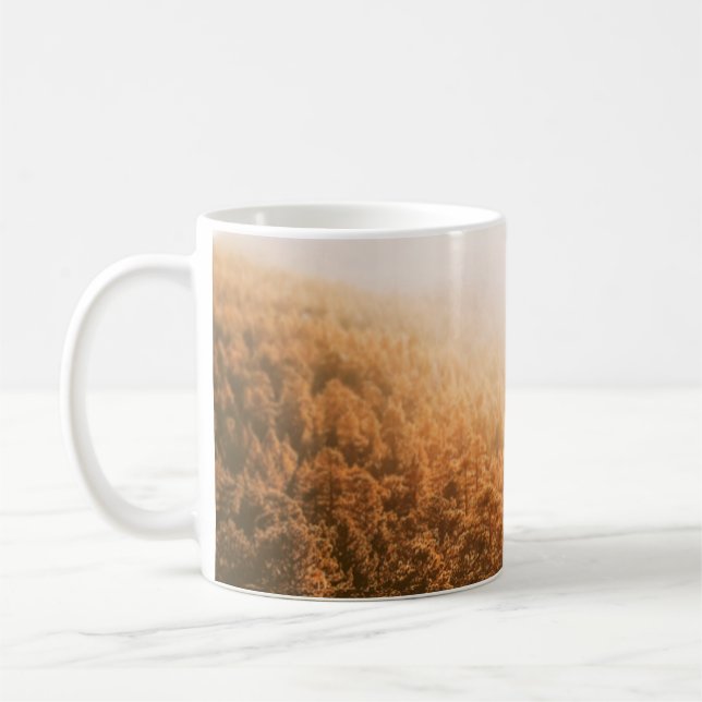 GOLDEN SUN OVER A FOREST COFFEE MUG (Left)