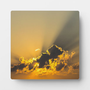 Golden Sunset Illuminating a Cloud Plaque