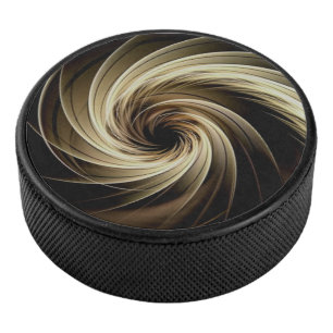Golden Swirl Across Black Hockey Puck