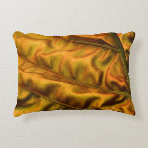 Golden textile accent pillow