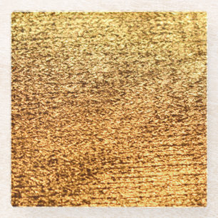 Golden textile: glamourous macro background. glass coaster