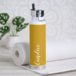Golden Yellow Personalized Wedding Bridesmaid Water Bottle<br><div class="desc">Gift your wedding bridesmaid or maid of honour with this trendy, vacuum Insulated water bottle that features her name in white stylized script on a golden yellow colour background designed to match your wedding colour scheme. Personalize bottle by editing and replacing name with your own as desired. Select your water...</div>