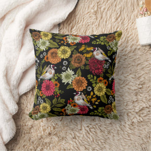 Goldfinches in the garden on black throw pillow