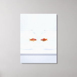 Goldfish in separate fishbowls looking face to fac canvas print