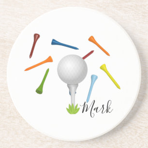 Golf ball and colorful tee on white  coaster