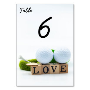 Golf ball and Tee with LOVE on white Table Number
