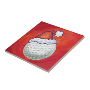 Golf Ball in Santa Hat on Red Tile