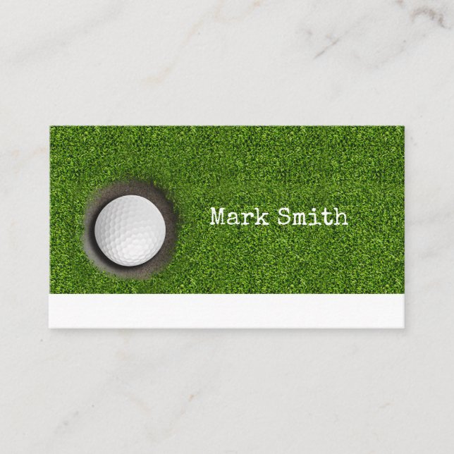 Golf ball is in the hole on green with name  business card (Front)