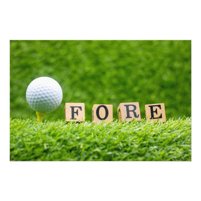 Golf ball is on tee with green grass background photo print (Front)