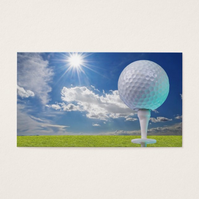 golf ball on a tee with grass (Front)