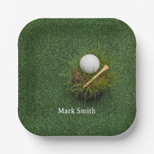 Golf ball on green grass for golfer paper plate