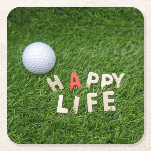 Golf ball on green grass happy life happy golfer square paper coaster (Front)