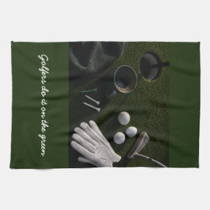 Golf ball on putting green kitchen towel