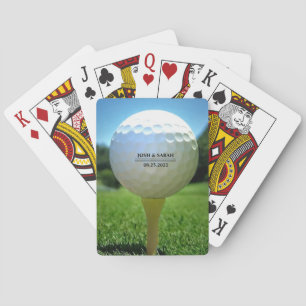 Golf ball on tee bicycle playing cards