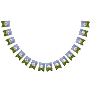 golf ball on tee in grass for 50th birthday bunting flags
