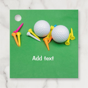 Golf ball with colour tee on green background favour tags
