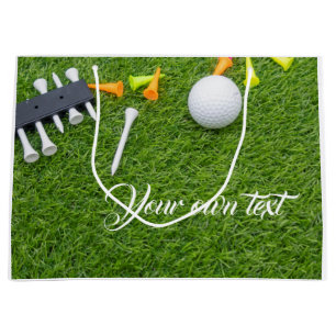 Golf ball with colourful tees on green grass large gift bag