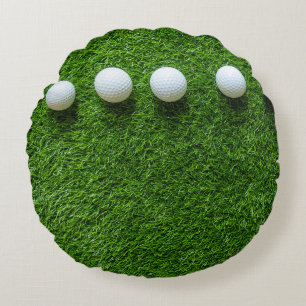 Golf Balls are on green grass Round Pillow
