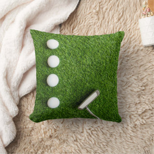 Golf Balls are on green grass Throw Pillow