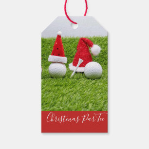 Golf balls with Santa hats Christmas are on green Gift Tags