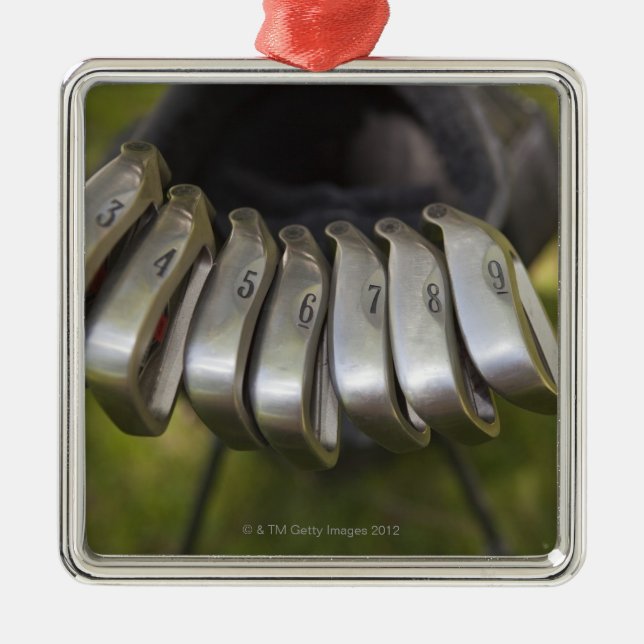 Golf club heads in a bag. Three through nine Metal Ornament (Front)