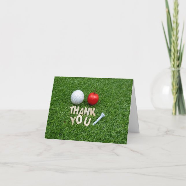 Golf merci avec pomme et balle de golf sur vert (Devant)