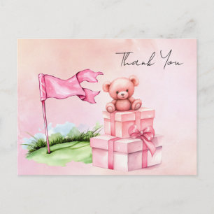 Golf teddy bear with pink gift box on green postcard