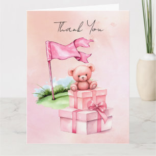 Golf teddy bear with pink gift box on green thank you card