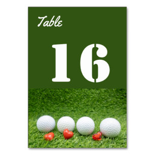 Golf with love on green grass table number