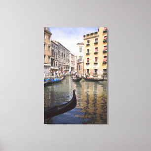 Gondolas in a canal, Venice, Italy Canvas Print