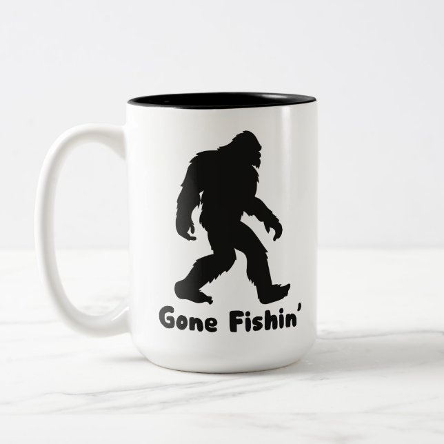 Gone Fishin’ Bigfoot Sasquatch Two-Tone Coffee Mug (Left)