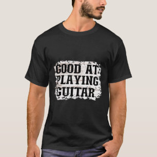 Good At Playing Guitar Light Brown Background T-Shirt