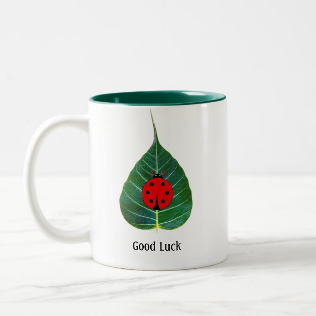 Good Luck Ladybug on Leaf Two-Tone Coffee Mug (Left)