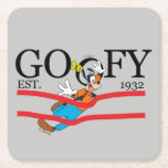 Goofy Est. 1932 Square Paper Coaster<br><div class="desc">Celebrate a legacy of laughter with this classic "Goofy Est. 1932" heritage design! Blending timeless collegiate-style typography with dynamic Goofy character art, this graphic captures a moment of pure, clumsy joy. The bold black serif lettering is accented by vibrant red racing stripes, giving the piece an athletic, vintage-sportswear feel. The...</div>