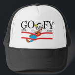 Goofy Est. 1932 Trucker Hat<br><div class="desc">Celebrate a legacy of laughter with this classic "Goofy Est. 1932" heritage design! Blending timeless collegiate-style typography with dynamic Goofy character art, this graphic captures a moment of pure, clumsy joy. The bold black serif lettering is accented by vibrant red racing stripes, giving the piece an athletic, vintage-sportswear feel. The...</div>