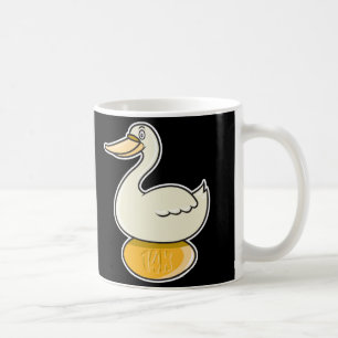 goose with golden egg coffee mug