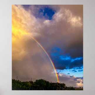 Gorgeous rainbow with blue sky and clouds poster