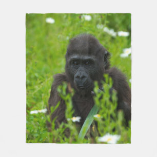 Gorilla Baby Hiding In The Grass Fleece Blanket