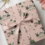 Goth St. Patricks Day Floral Skulls Irish Wedding Wrapping Paper<br><div class="desc">This unique and elegant Irish gothic wedding wrapping paper design features beautiful hand-drawn Irish-themed illustrations in black ink against an elegant blush pink background. Featuring green clovers, skulls, crows, green roses and wildflowers, this festive green wrapping paper is ideal for Irish weddings, bridal showers, and other March celebrations. Personalize with...</div>