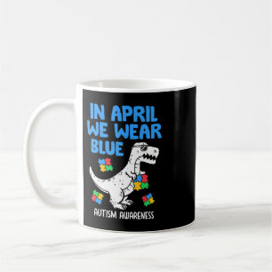 Grab this funny In April We Wear Blue Dinosaur Hol Coffee Mug